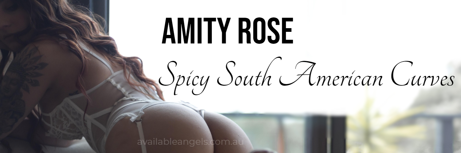 melbourne escort amity rose banner woman on couch in lingerie